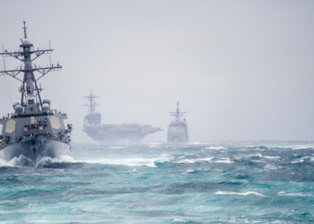 131210-N-VC599-169ATLANTIC OCEAN (Dec. 10, 2013) Ships from the George H.W. Bush Carrier Strike Group simulate a strait transit. The strike group is conducting a pre-deployment evaluation. (U.S. Navy Photo by Mass Communication Specialist 2nd Class Justin Wolpert/Released)