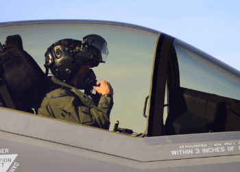 U.S. Air Force Major Kevin Hall goes through his pre-flight checks before flying an F-35A at Hill Air Force Base, Utah. Hall is an F-35 test pilot. (U.S. Air Force photo by Airman 1st Class Joshua D. King/ RELEASED)