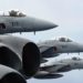 Caças F-15 da Força de Autodefesa Aérea Japonesa escoltam um B-52H Stratofortress. Foto Devin Rumbaugh
