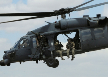 (FILES) A file picture taken on April 21, 2010, shows a US Airforce HH-60 Pave Hawk helicopter conducting a rescue operation during Exercise Angel Thunder, near the town of Bisbee in Arizona's Sonoran Desert. Four people are believed to have been killed in a helicopter crash in eastern England on Tuesday January 7, 2013, police said, with a local US Air Force base confirming they were "working on an incident". A spokesman from the US Air Force base at nearby Royal Air Force (RAF) station Lakenheath confirmed they were "working on an incident" involving a Sikorsky HH-60 Pave Hawk aircraft that had been "conducting low-level training in the area". AFP PHOTO / MARK RALSTON/FILES